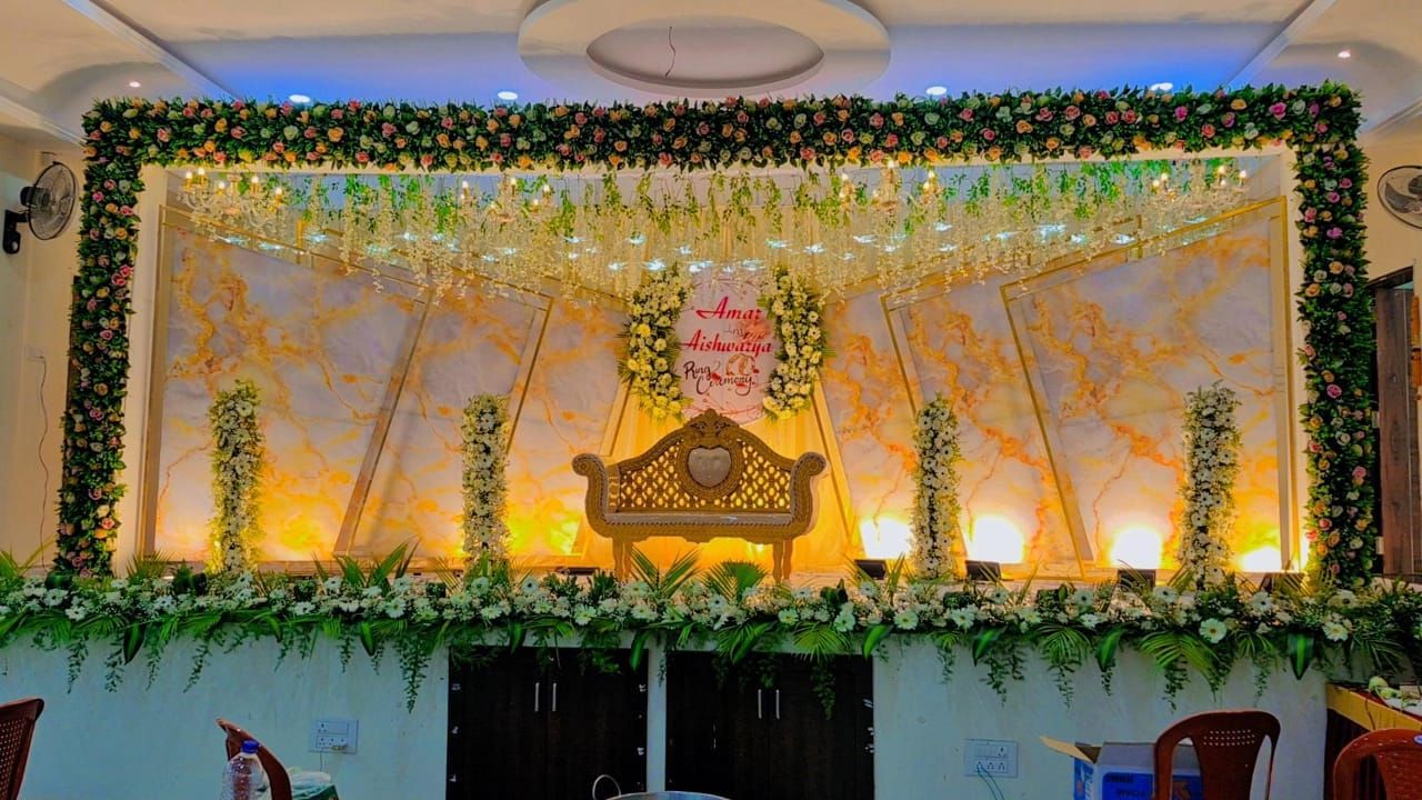 Golden marble stage setup at Nirmale Convention Hall